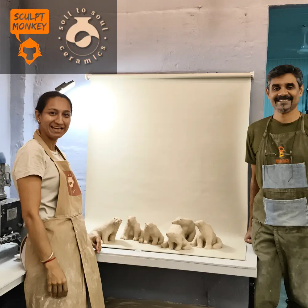 Reema and Barney with all polar bears from the Animal Sculpting Workshop at Soil to Soul Ceramics